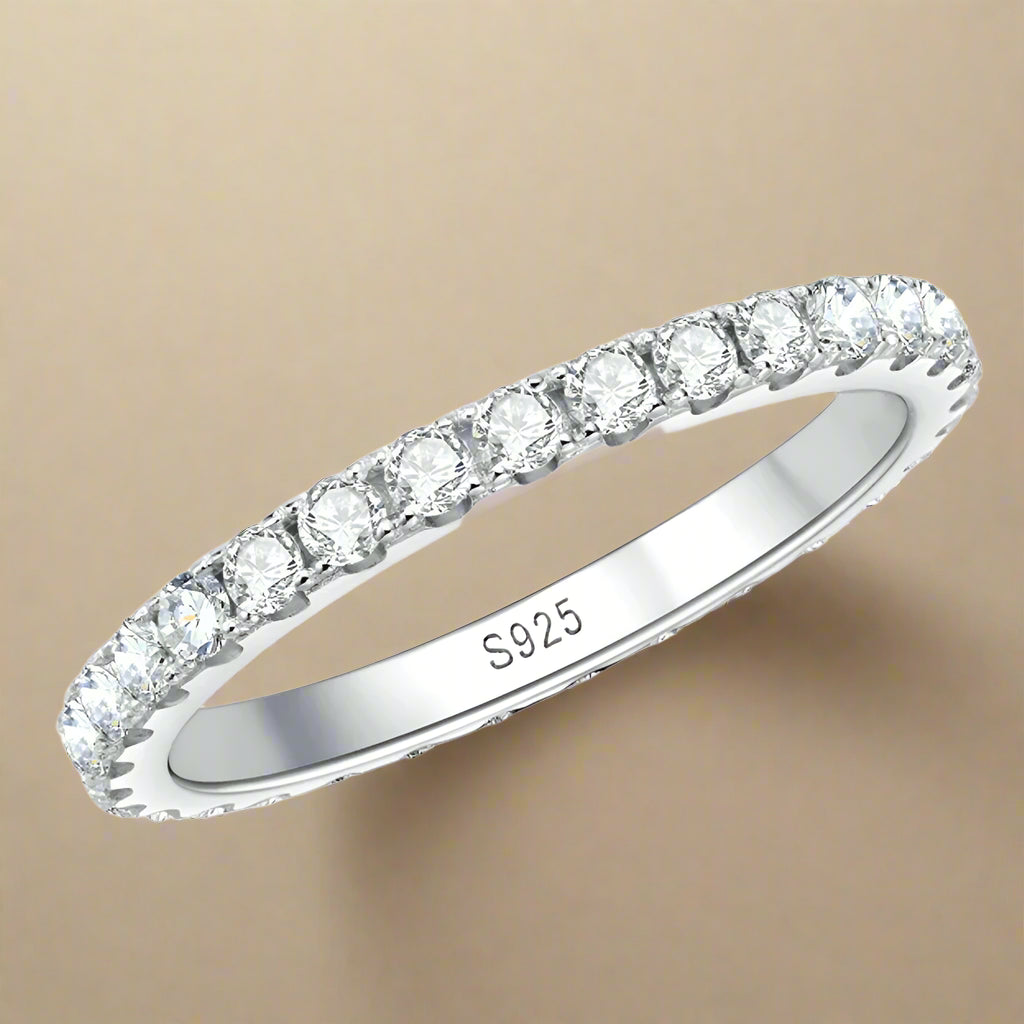 Ring displayed flat showing seamless stone alignment