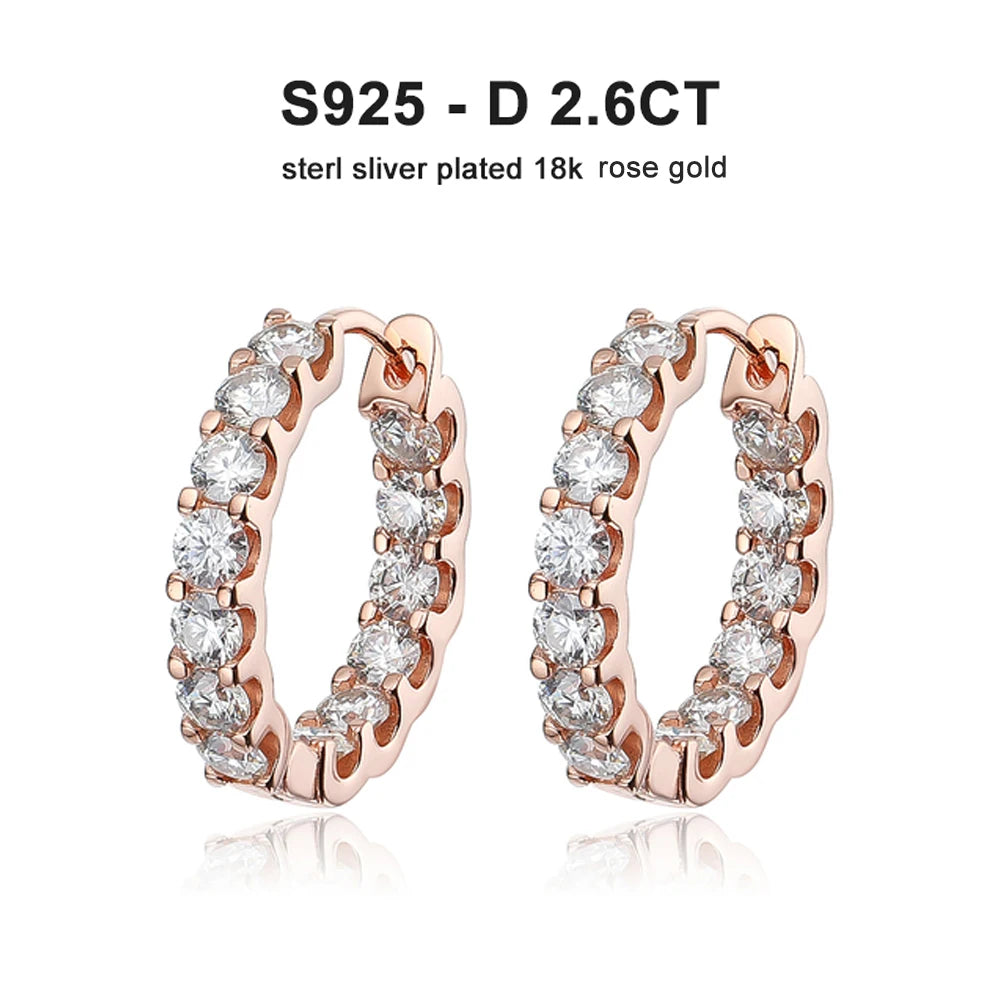 moissanite hoops displayed in silver, gold, and rose finishes