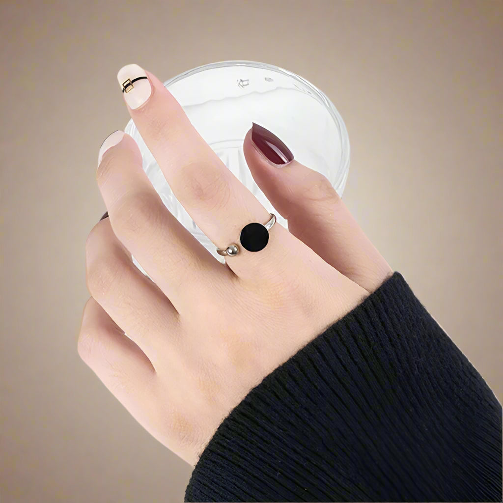 Model writing with the ring on – casual lifestyle image