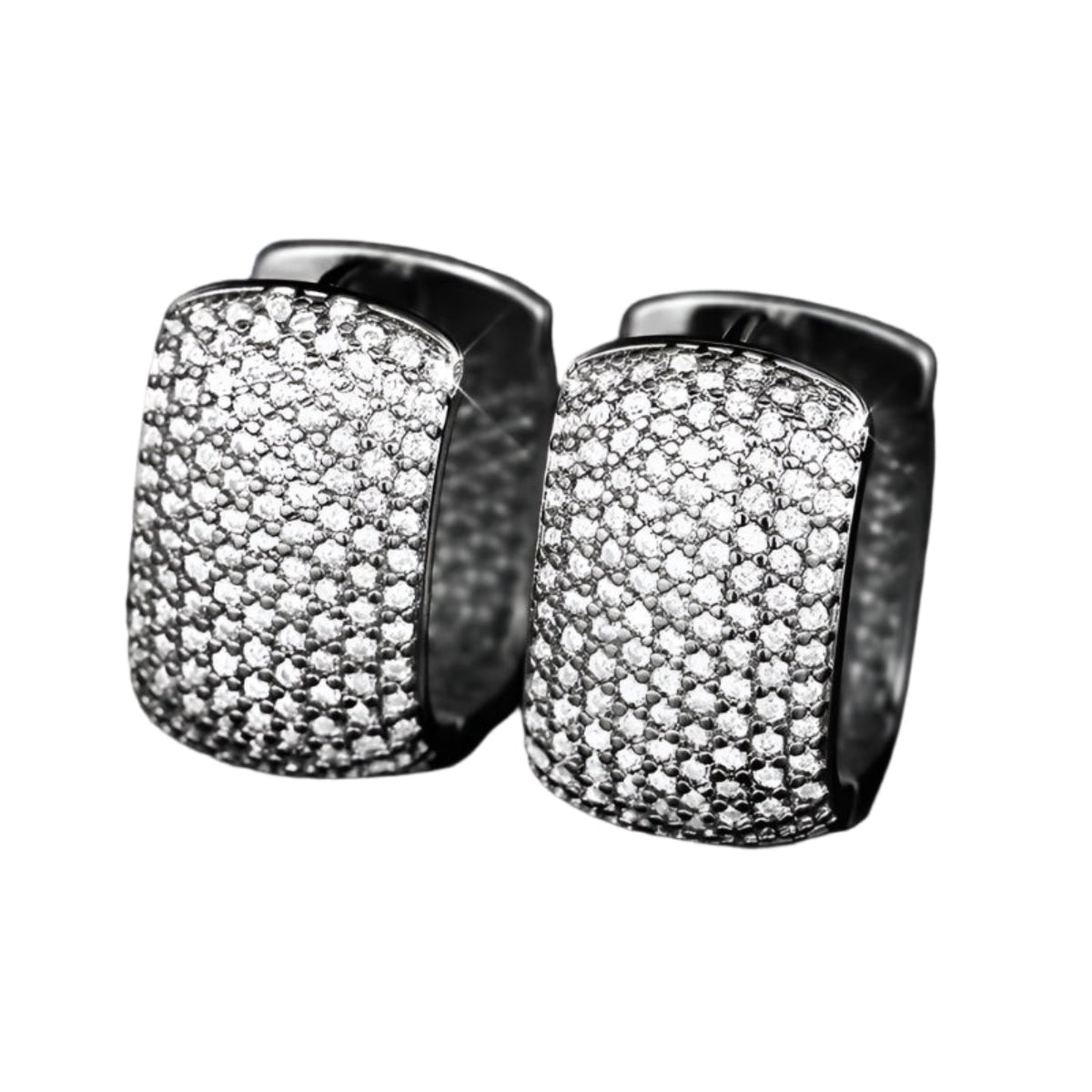 Close-up of silver and gold cubic zirconia earrings