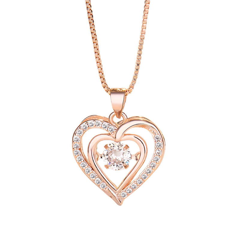 Heart-shaped pendant with crystal on rose gold chain.