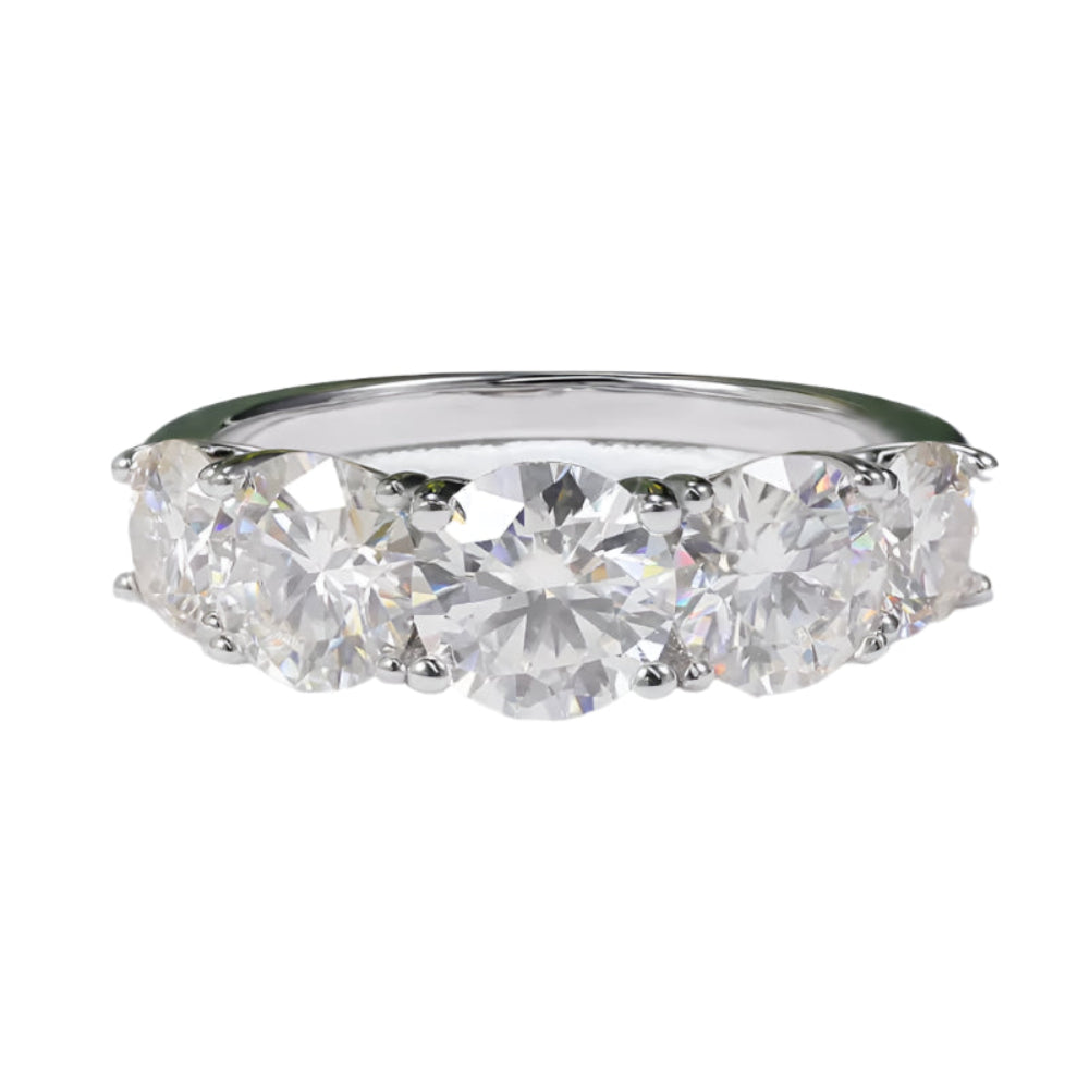 Close-up of luxury silver ring against white background.