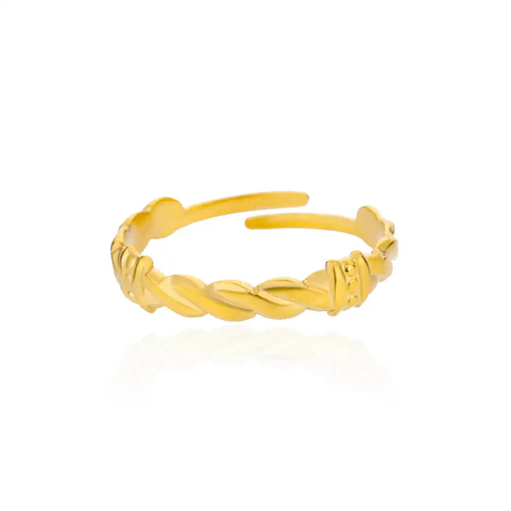 Gold braid design adjustable ring on white background. 