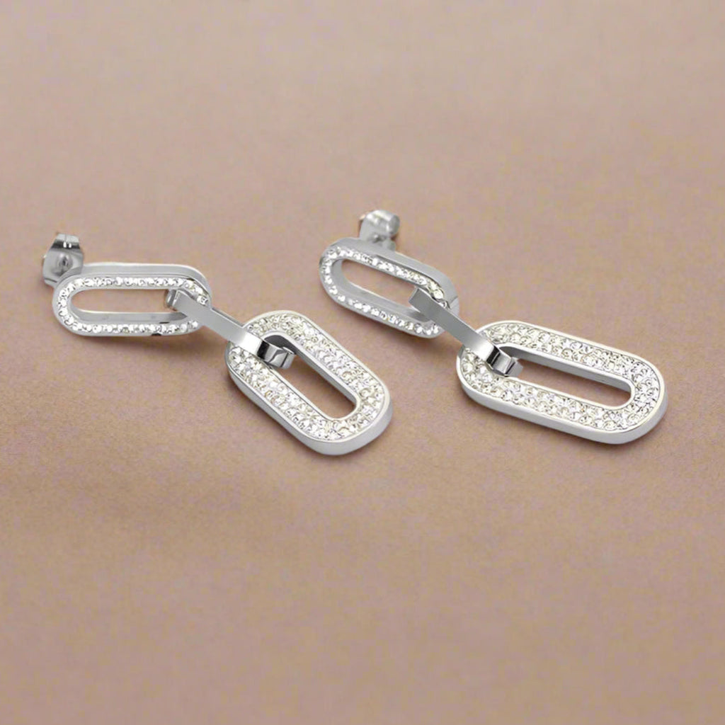 Glamorous gold chain earrings displayed on product card