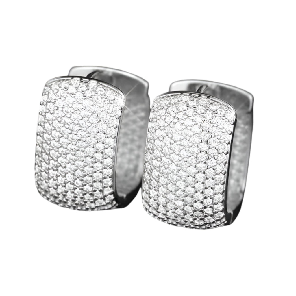 Silver U-shaped hoop earrings with cubic zirconia on black background