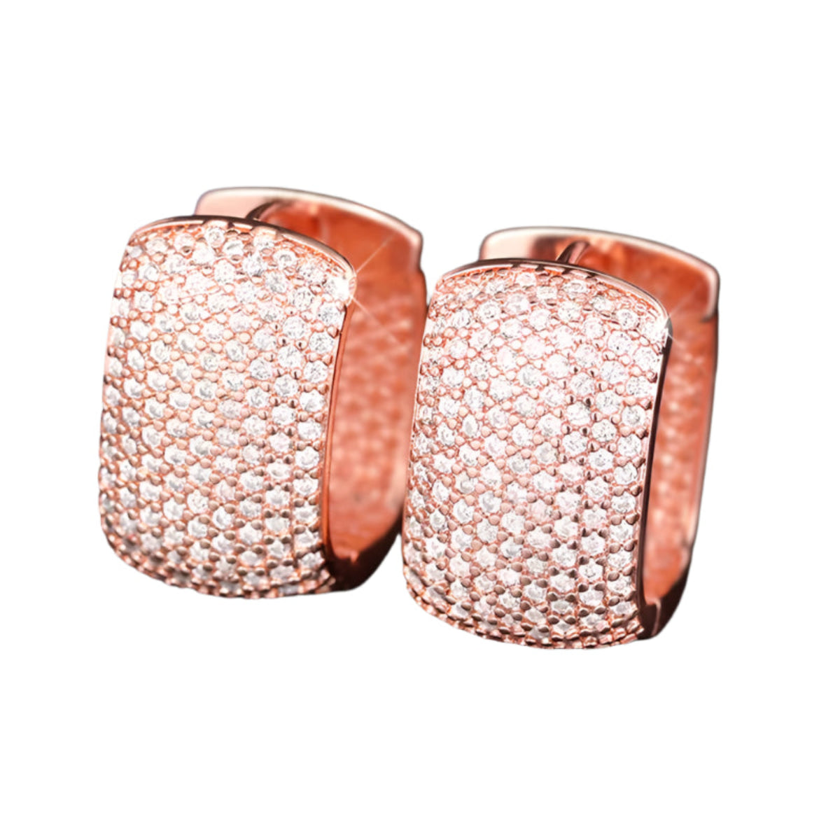 Close-up of silver and gold cubic zirconia earrings