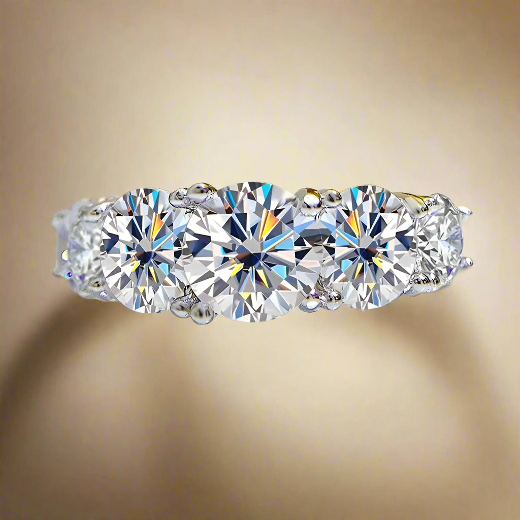 Sterling silver ring with five trillion-cut stones.