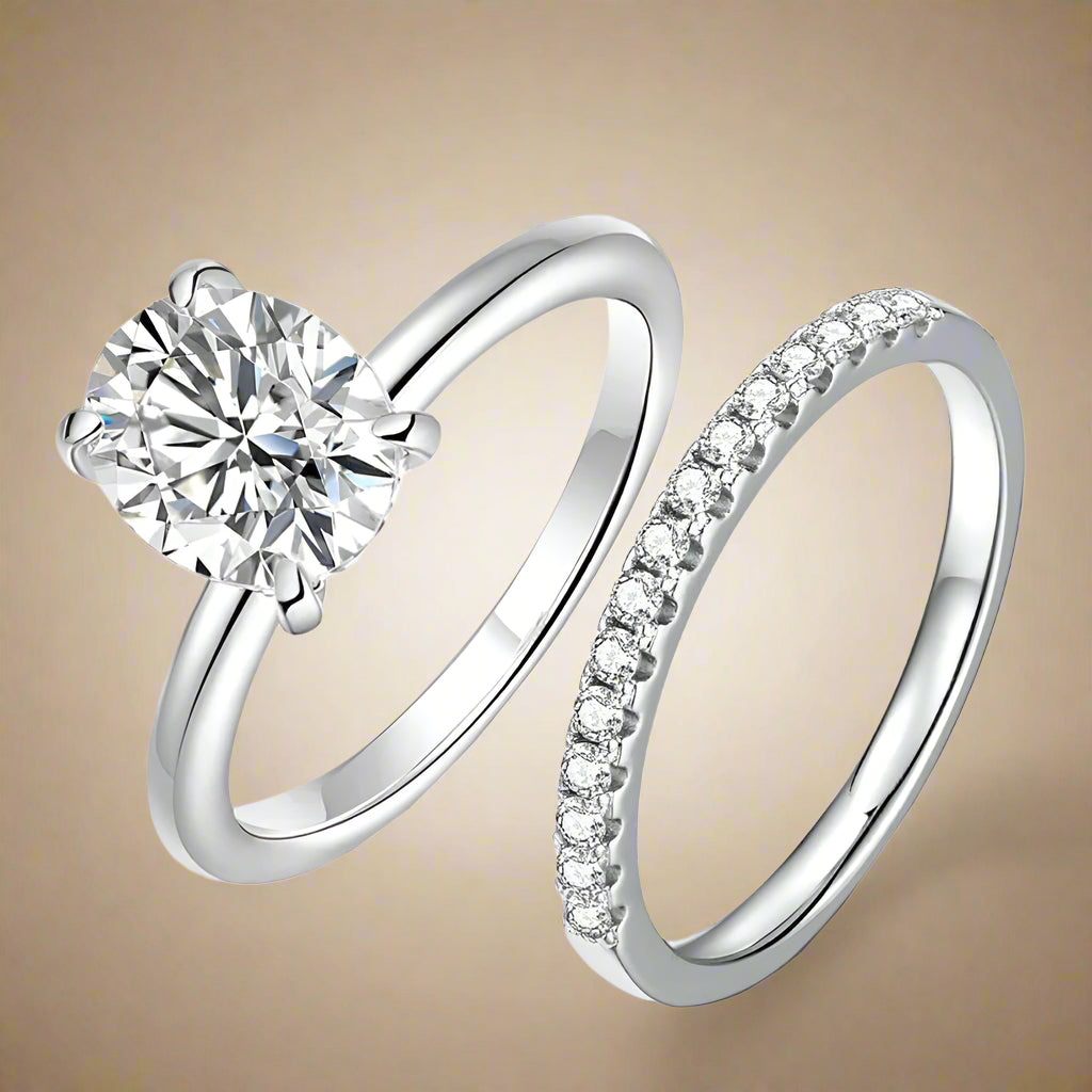Sterling silver ring set with solitaire and pave bands.
