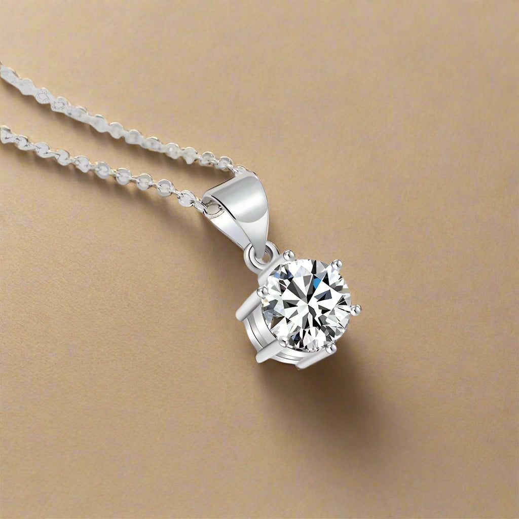 Close-up of Lumière Moissanite Pendant Necklace showcasing 4ct D Color stone in sterling silver setting