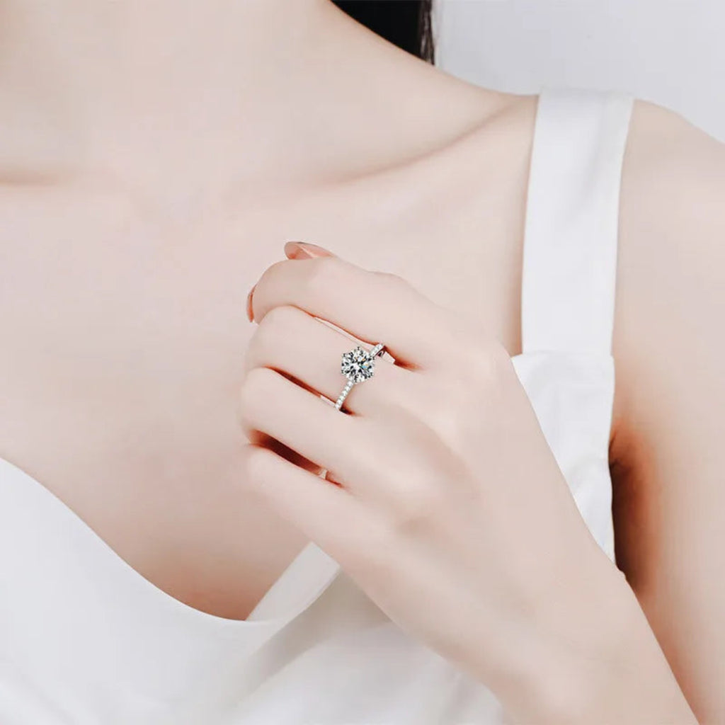 Side angle showing profile of crown setting and accent stones