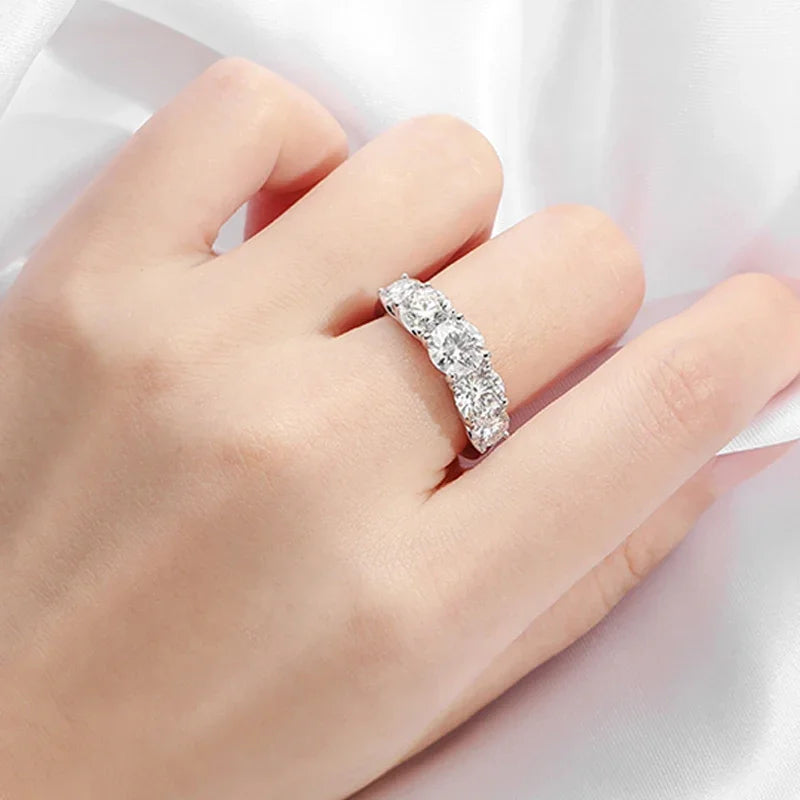 Sterling silver ring with five trillion-cut stones.  