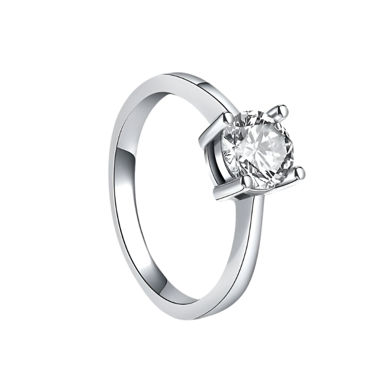 Silver ring with a diamond on a white background, featuring a 'Sterling Silver 925' stamp.