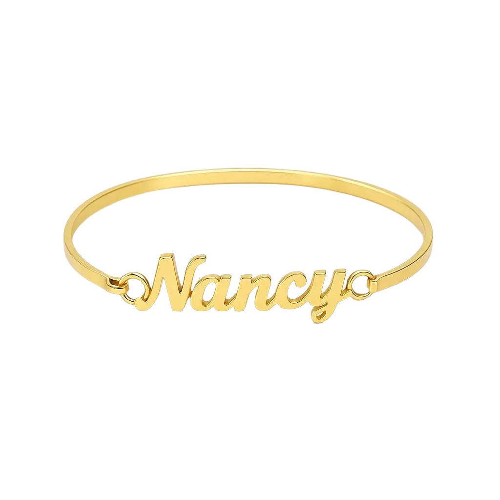 Gold bracelet with 'Nancy' engraving on a white background