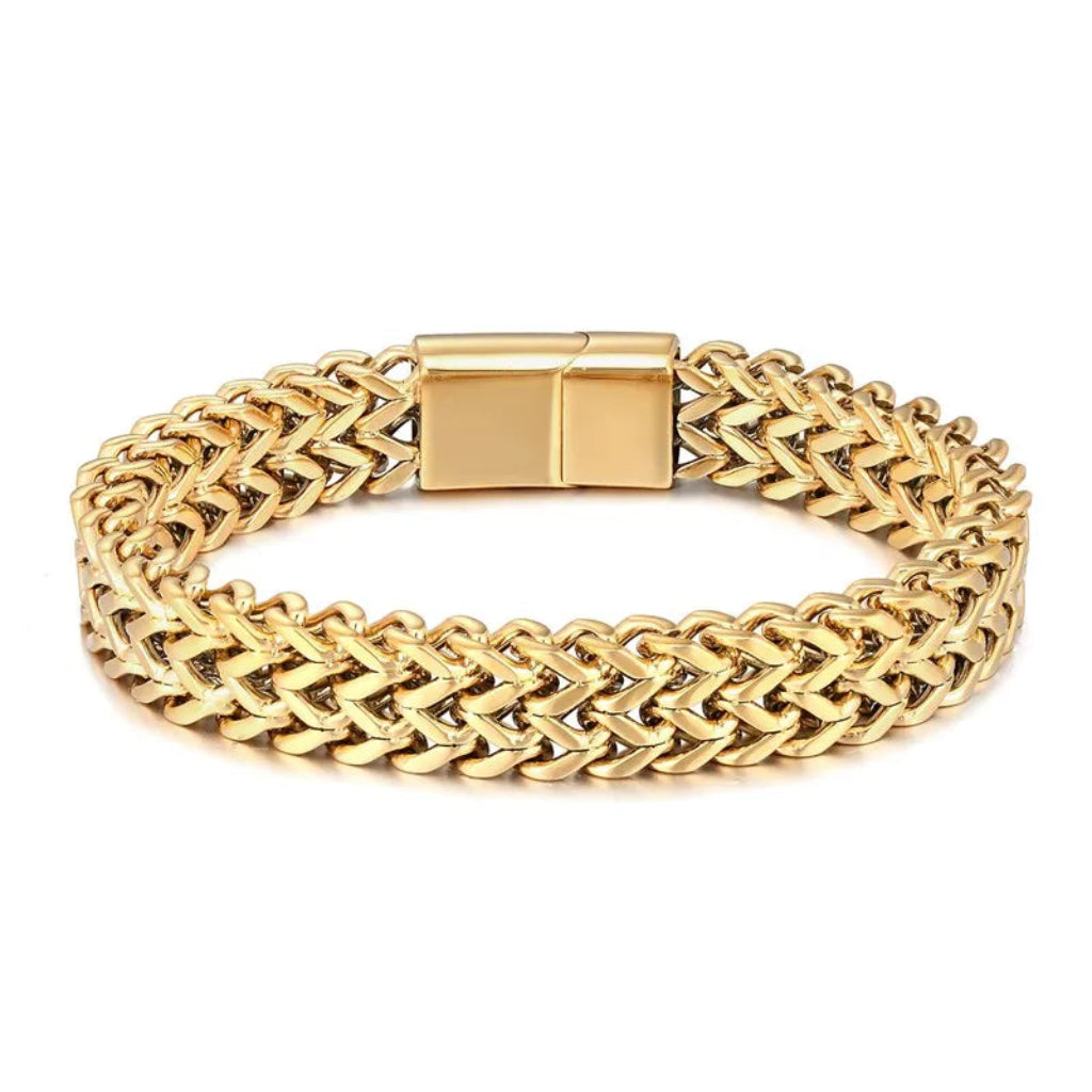 Gold chain bracelet on a white background